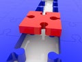 A close-up of a red puzzle piece between blue puzzle pieces as a connecting piece Royalty Free Stock Photo