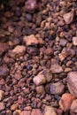 Close up on red rock soil
