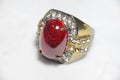 Isolated shot of luxury ruby gold ring on white background Royalty Free Stock Photo
