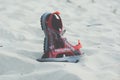 red sandals on a sandy beach Royalty Free Stock Photo