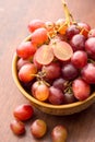 Close up red seedless grapes in a ceramic bowl Royalty Free Stock Photo