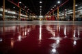 close up on the red stained epoxy floor in a big, empty, dark, industrial-looking storage area Generative Ai Royalty Free Stock Photo