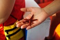 Red starfish held in a hand Royalty Free Stock Photo