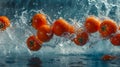 Close-up red tomatoes cherry splashing into water Royalty Free Stock Photo