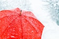 Close up of red umbrella in snow Royalty Free Stock Photo