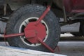 Close up of a red Wheel clamp Royalty Free Stock Photo