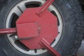 Close up of a red Wheel clamp Royalty Free Stock Photo