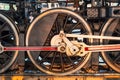 Close-up of red wheels of an old retro steam train locomotive Royalty Free Stock Photo