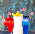 Close up of red, white and blue cocktails for a fourth of July celebration.