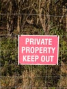 Close up of red and white country sign private property keep out Royalty Free Stock Photo