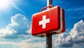 Close-up of a Red and White First Aid Sign on Blue sky with Clouds - Generative Ai Royalty Free Stock Photo