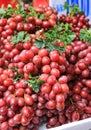Close-up red wine grapes fruit background at local market Royalty Free Stock Photo