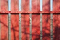 Red wooden fence