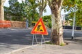 Road works sign on sunny street Royalty Free Stock Photo