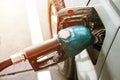 Close up Refueling Car fill with gasoline at a gas station and with fuel at he refuel station. Car refueling on petrol pump Royalty Free Stock Photo