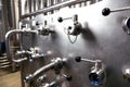 Close up of regulators and pipes in brewery Royalty Free Stock Photo