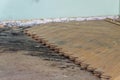 Close-up of removing old wooden parquetry on the floor