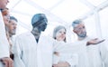 Chemists working in protective suits in the lab Royalty Free Stock Photo