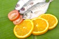 Close up resh fish isolated on banana leaf