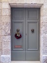 close up retro style old house door of Mediterranean architectural culture in Mediterranean island Malta Royalty Free Stock Photo