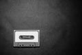 Close up of retro vintage audio cassette tape on black background