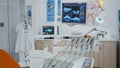 Close up revealing shot of medical orthodontic display with teeth xray images