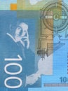 Close up of reverse of 100 dinars paper bill issued by Serbia, that shows portrait of scientist Nikola Tesla