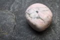 Close up of an Rhodochrosite stone