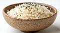 Close up of rice with black sesame seeds in a brown ceramic bowl Royalty Free Stock Photo