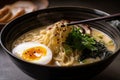 close-up of rich and creamy tonkotsu ramen, with swirls of delicious broth