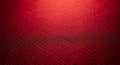 Close-up of a rich red textured fabric with a repeating chevron pattern and shallow depth of field Royalty Free Stock Photo