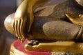 close up of the right hand of buddha statue in temple thailand