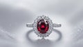 a close up of a ring with a red stone surrounded by diamonds Royalty Free Stock Photo