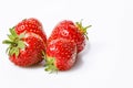 Close-up ripe and tasty strawberries on a white background. Sweet red juicy strawberries. Organic farmers fat-free, low-calorie Royalty Free Stock Photo