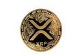 Close-up of a Ripple XRP coin with intricate circuit design.