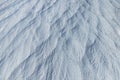 Ripples texture of calcite and other mineral rocks in carbonate travertines near hot springs in Pamukkale,