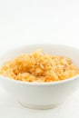 Close up of risotto in a white bowl, room for text Royalty Free Stock Photo