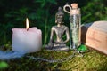 Close-up. A ritual with candles and an old book in the forest. Divination, astrology and esotericism Royalty Free Stock Photo