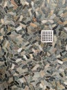 Close up river stone and rock custom shower floor