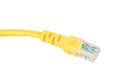 Close-up of the RJ-45 network connection plug of the yellow Ethernet cable of the LAN network connection. Royalty Free Stock Photo