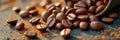 Close-up of roasted coffee beans and ground coffee on rustic surface Royalty Free Stock Photo