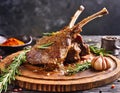 Close-up of roasted lamb meat, dish on a board