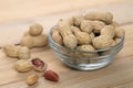 Close up Roasted peanuts in wooden bowl. rich in protein, fat, and fiber Royalty Free Stock Photo