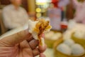 Close up roasted red pork Steam Buns on the tourist hand