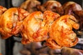 Close-up of roasted whole chicken with tasty golden skin