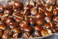 Close-up of roasting chestnuts on a charcoal grill, macro photo Royalty Free Stock Photo