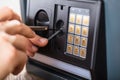 Hand Trying To Break Home Security Safe Royalty Free Stock Photo