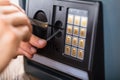 Hand Trying To Break Home Security Safe Royalty Free Stock Photo
