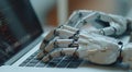 Close-up of a robot hand typing on a laptop keyboard, representing artificial intelligence in technology and automation