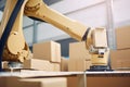 close-up of robotic arm, handling and palletizing boxes